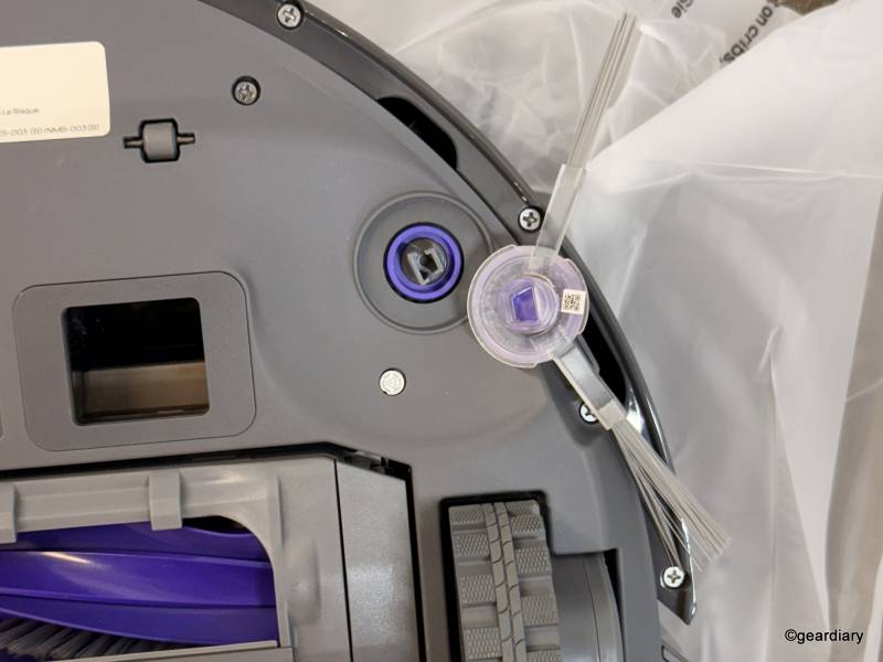 Installing the right side brush on the Narwal Freo Z Ultra