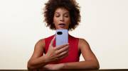 Woman holding a Google Pixel 9a