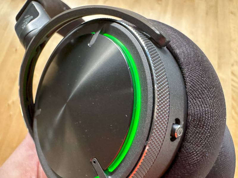 Lighting effects on the Corsair Virtuoso Max ear cup.