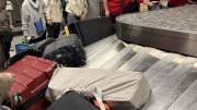 LEVEL8 Voyageur Checked 30" on a luggage conveyor belt at DFW