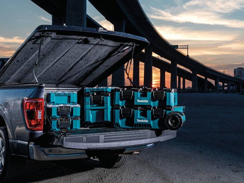 Makita MAKTRAK System in the back of a worker's truck