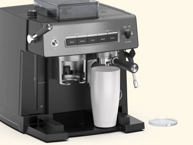A full size travel mucg under the Cuisinart Espresso Bar Grind & Brew Espresso Machine