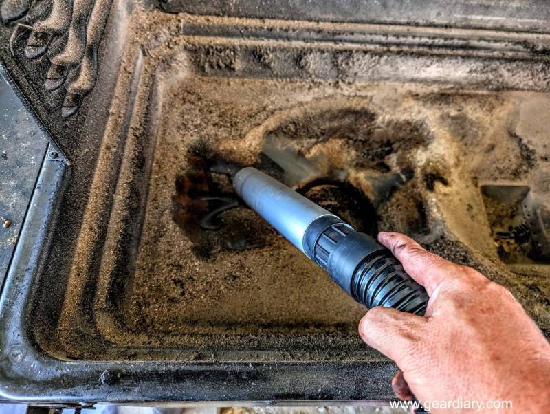 The author cleaning his grill with the Craftsman 5-Gallon Grill and Ash Vacuum