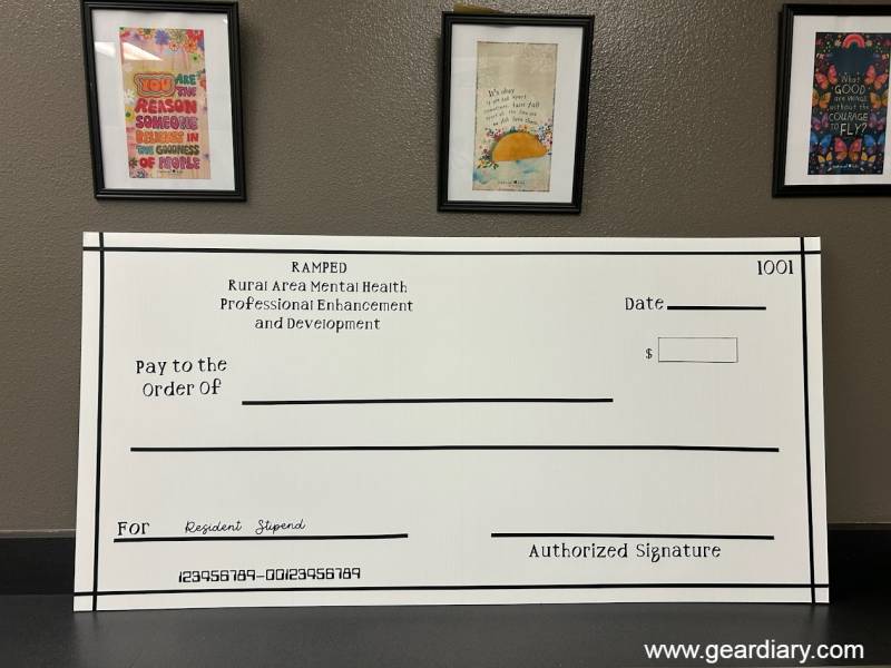 A ceremonial check made with the Cricut Maker 4