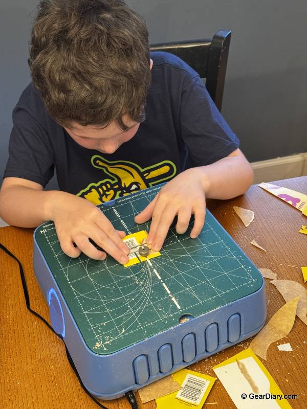The author's son using the ChompSaw