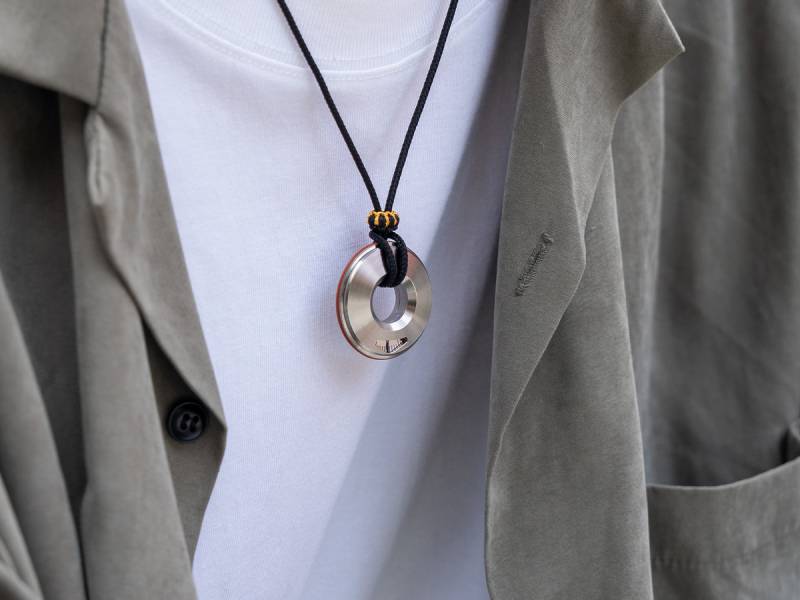 Titaner Tiroler 2.0 worn as necklace.