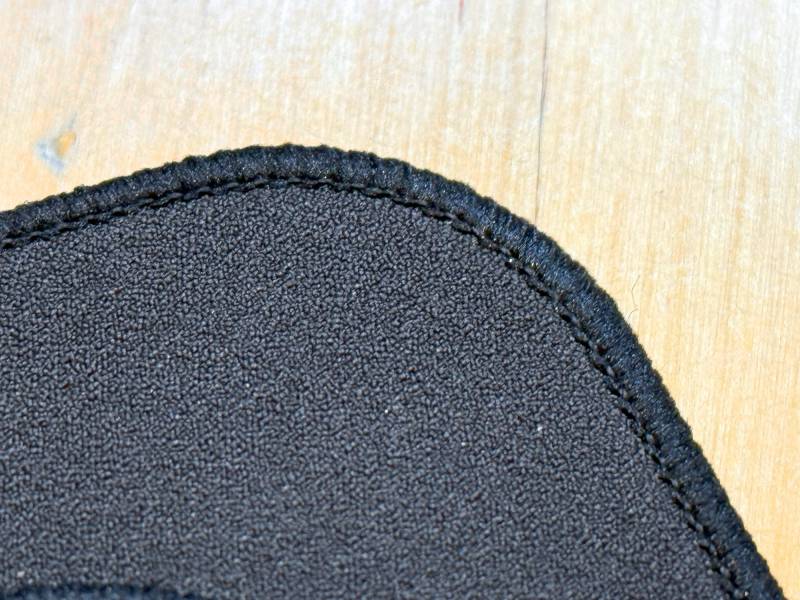 The edge of a SteelSeries QcK Performance Series Mousepad