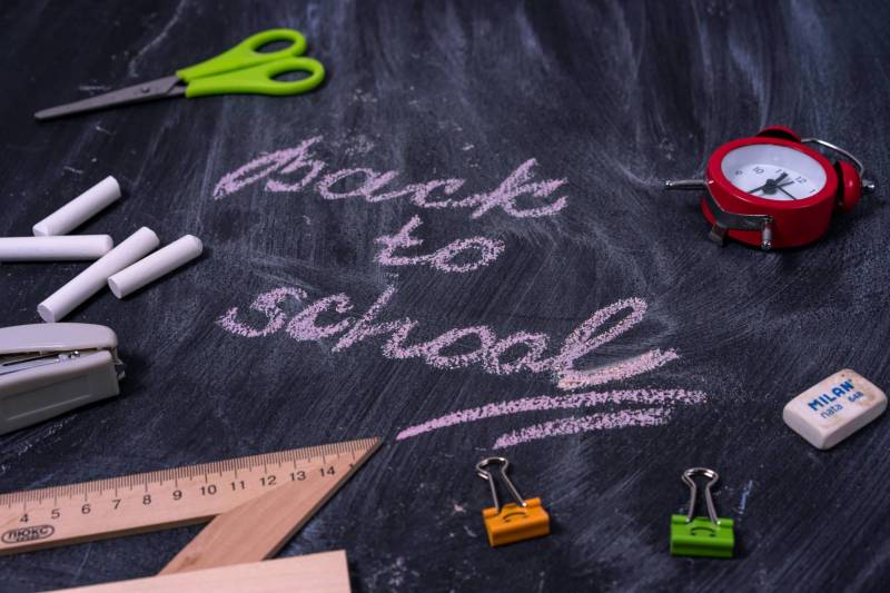 Back to School written on a chalkboard. 
