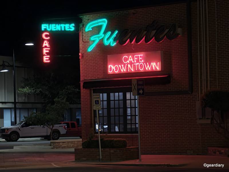 2025 Motorola Razr Ultra Review: Three Months with the Foldable Flip-Phone That’s Still the One to Beat 23 Low light photo of a restaurant sign with half the letters burned out