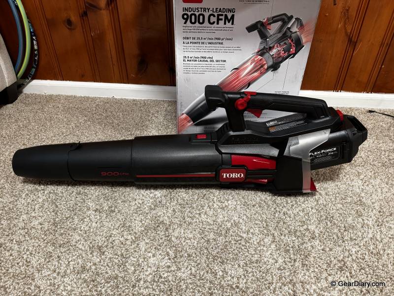 Toro 60V MAX 900 CFM Brushless Leaf Blower Review: Gas-Powered Performance Without the Hassle 4 Toro 60V MAX 900 CFM Brushless Leaf Blower sitting on the author's floor