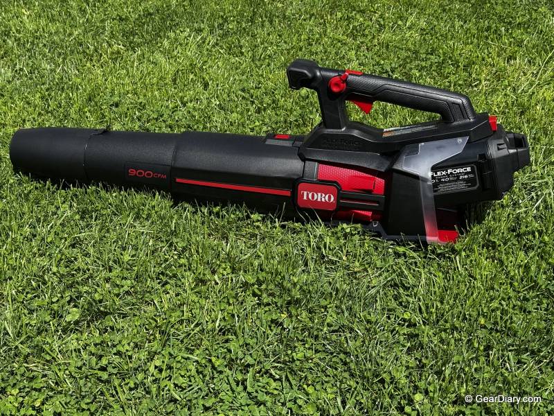 Toro 60V MAX 900 CFM Brushless Leaf Blower Review: Gas-Powered Performance Without the Hassle 1 Toro 60V MAX 900 CFM Brushless Leaf Blower sitting on the author's lawn.