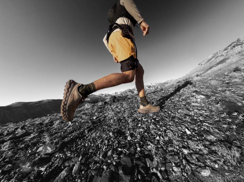 Hypershell X Ultra Exoskeleton Will Allow You to Hike Farther, Cycle Easier, and Conquer Any Terrain 5 Man running while wearing the Hypershell X Ultra
