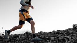 Man running while wearing the Hypershell X Ultra