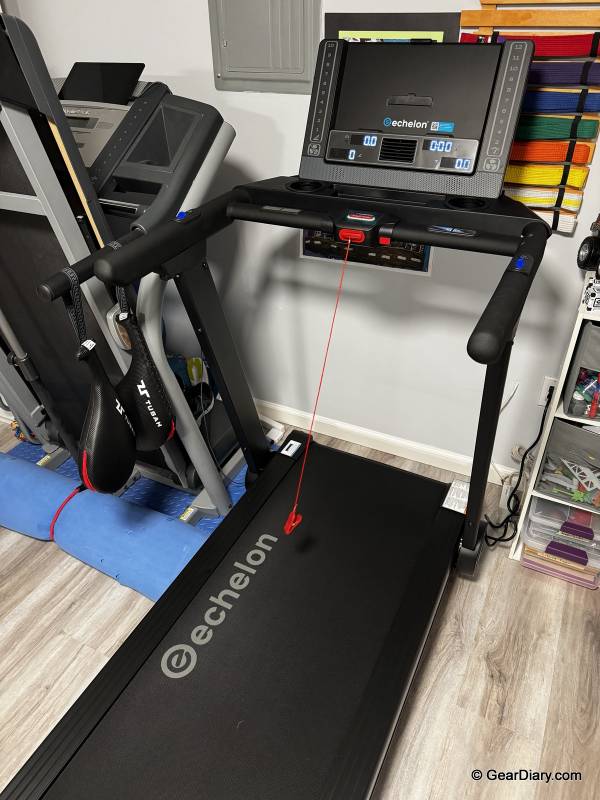 Echelon Stride-6 Treadmill Review: The Quiet, Space-Saving Treadmill That Actually Folds Flat 3 The Echelon Stride-6 next to the author's older NordikTrak treadmill