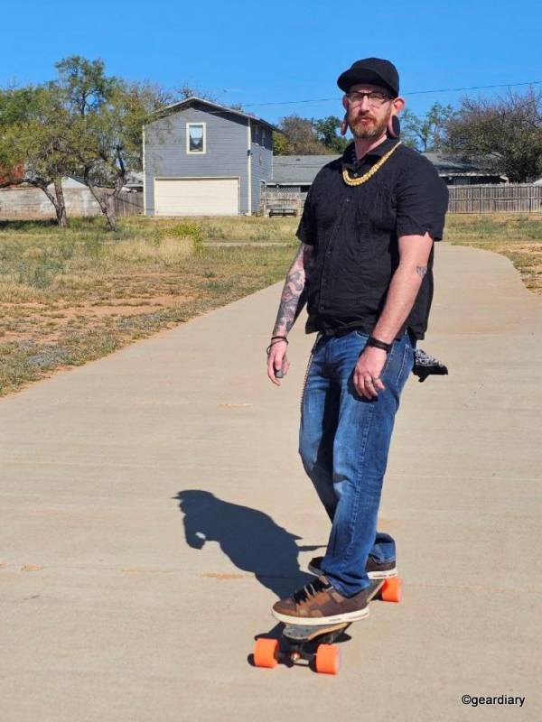 MEEPO Go Review: A Fast, Stable, 1500W Electric Skateboard Perfect for Heavier Riders 1 The author riding the MEEPO Go