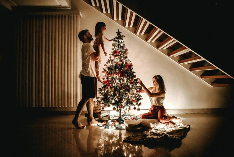 Family with a christmas tree