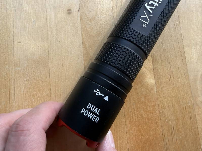 Infinity X1 7000 L Dual Power Flashlight Review: A Featured-Packed 7000 Lumen Powerhouse 16 The end of the handle on the Infinity X1 7000 L Dual Power Flashlight