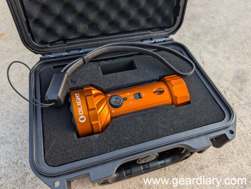 Olight Marauder Mini 2 Review: A Compact 10,000-Lumen Flashlight Built for Serious Outdoor and Emergency Use 1 Olight Marauder Mini 2 in its protective travel case.