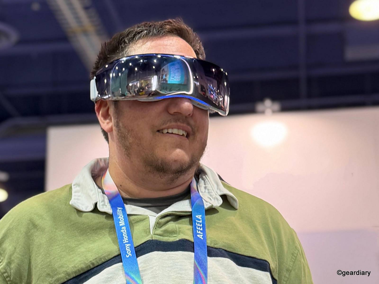Caleb wearing the SKG KS700-E