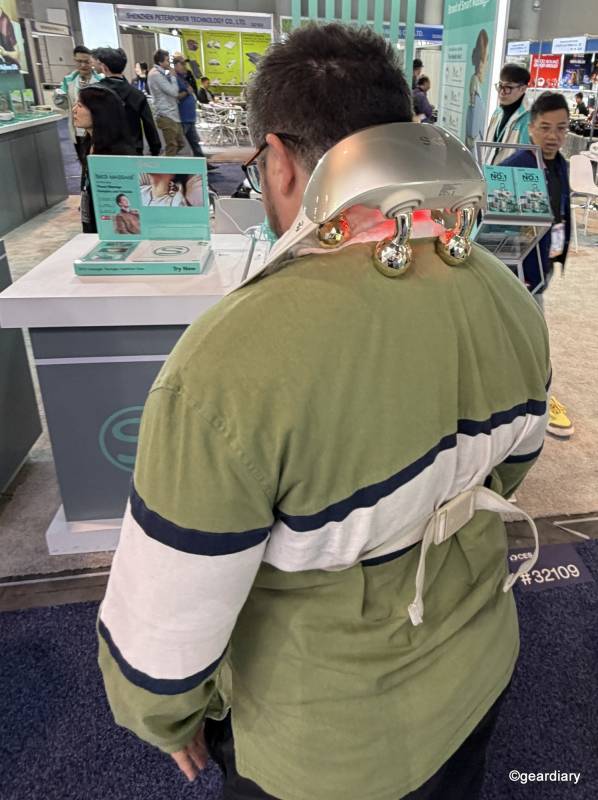 Caleb wearing the SKG H7 Ultra Neck and Head Massager