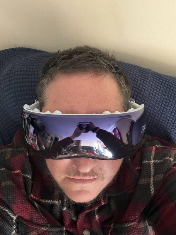 SKG Eye Massager Review: Heat, Cooling, and Compression That Actually Help Relieve Headaches 1 The author wearing an SKG eye massager