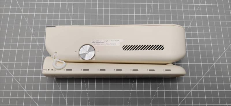Side view of the folded Enya Cyber-G Pocket Guitar