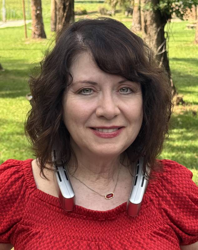 TORRAS COOLiFY Cyber Fold AI Neck Air Conditioner Review: Your Personal AC for Surviving Summer Heat 6 The author's spouse wearing the TORRAS COOLiFY Cyber Fold AI Neck Air Conditioner