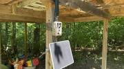 GardePro X66 Pro mounted on a post