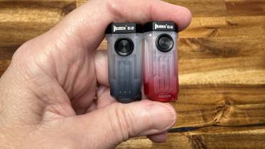 Holding two Wuben E2 Pulse flashlights