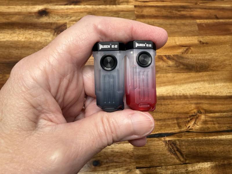 Wuben E2 Pulse Flashlight Review: A Tiny EDC Flashlight for Your Keychain 1 Holding two Wuben E2 Pulse flashlights