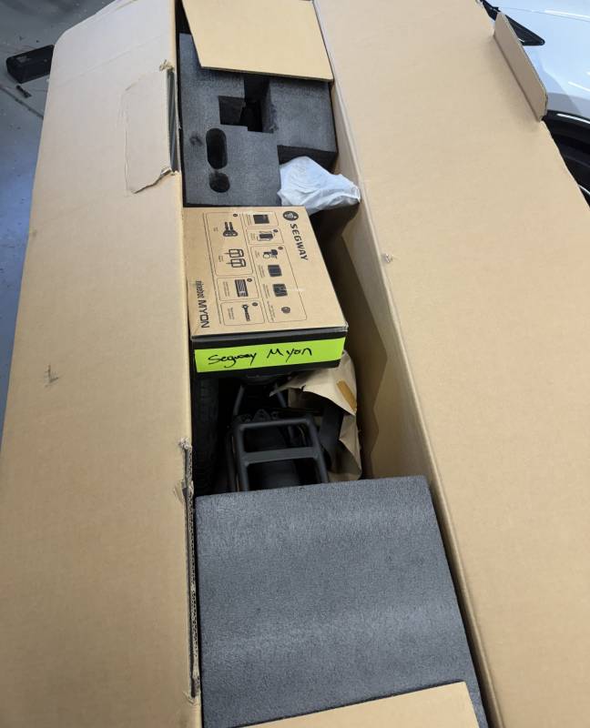 Segway Myon E-bike Review: High-Tech Features That'll Make Your Car Jealous 3 Opening the Segway Myon shipping box