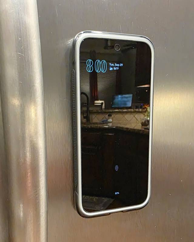 TORRAS Ostand Q3 Air Case Review: MagSafe Compatible with Built-in Rotating Adjustable Stand and Drop Protection up to 4m (13ft) 29 TORRAS Ostand Q3 Air Case on the side of a refrigerator