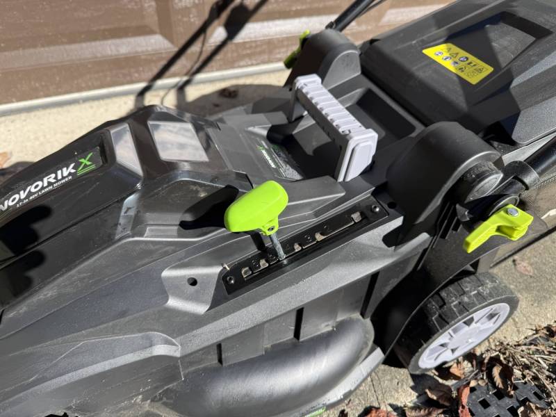 NovorikX 40V Electric Cordless Lawn Mower Review: Lightweight, Simple, and Surprisingly Capable 8 NovorikX 40V Electric Cordless Lawn Mower height adjustment lever