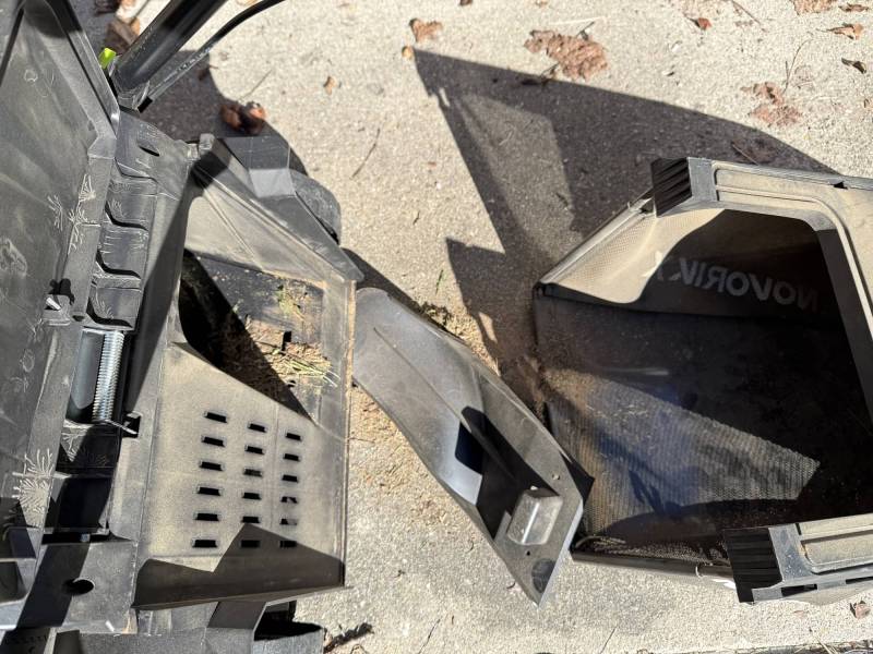 NovorikX 40V Electric Cordless Lawn Mower Review: Lightweight, Simple, and Surprisingly Capable 7 NovorikX 40V Electric Cordless Lawn Mower grass plug