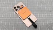 ORICO MG7 attached to the back of an iPhone