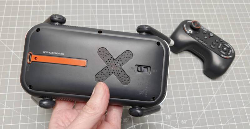 Ruko R1 Mini Robot Dog Review: A Cute, No-App Robot Toy for Kids 3 Ruko R1 Mini Robot Dog charging port and power button