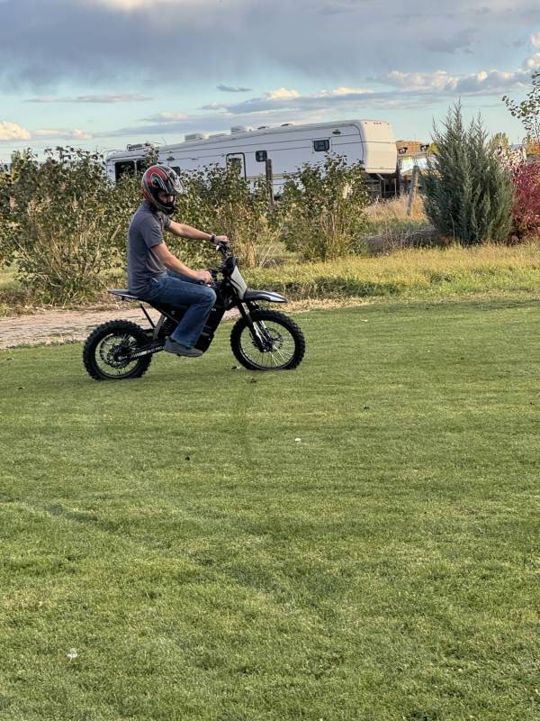 Yozma IN 10 Pro Electric Dirt Bike Review: This Dirt Bike Is Too Fun and Sadly Not Street Legal, So Keep It to the Trails! 16 The author's brother riding the Yozma IN 10 Pro Electric Dirt Bike