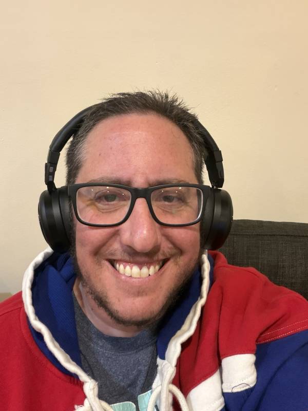 TDM. NEO Review: These Headphones Have a Twist — They Turn into a Portable Speaker! 15 The reviewer wearing the TDM. NEO.