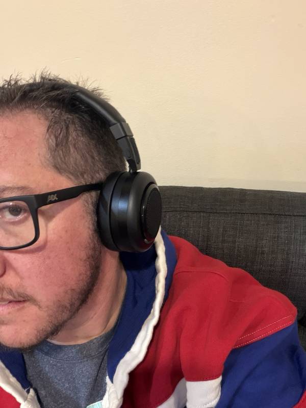 TDM. NEO Review: These Headphones Have a Twist — They Turn into a Portable Speaker! 16 The reviewer wearing the TDM. NEO