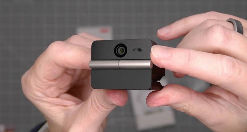 OBSBOT Meet Flip Webcam Review: A Pocket-Size 4K Webcam That Folds Away When You’re Done 1 Holding the OBSBOT Meet Flip